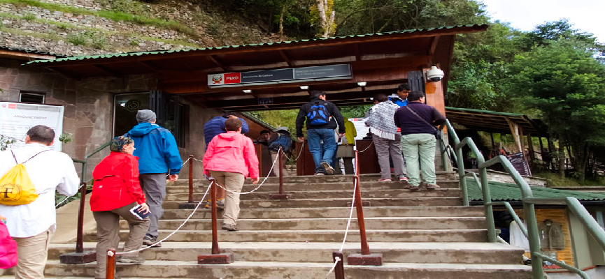 Tourists at the entrance and access control of Machu Picchu citadel